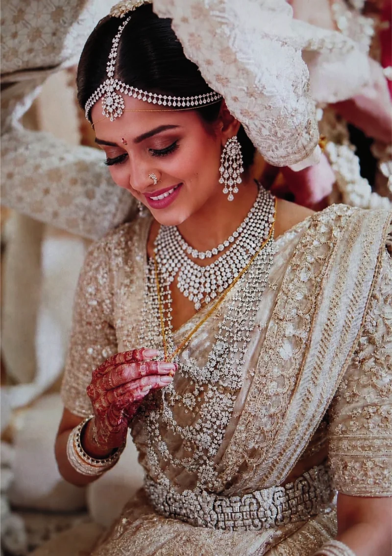 A bride admiring her diamond jewellery